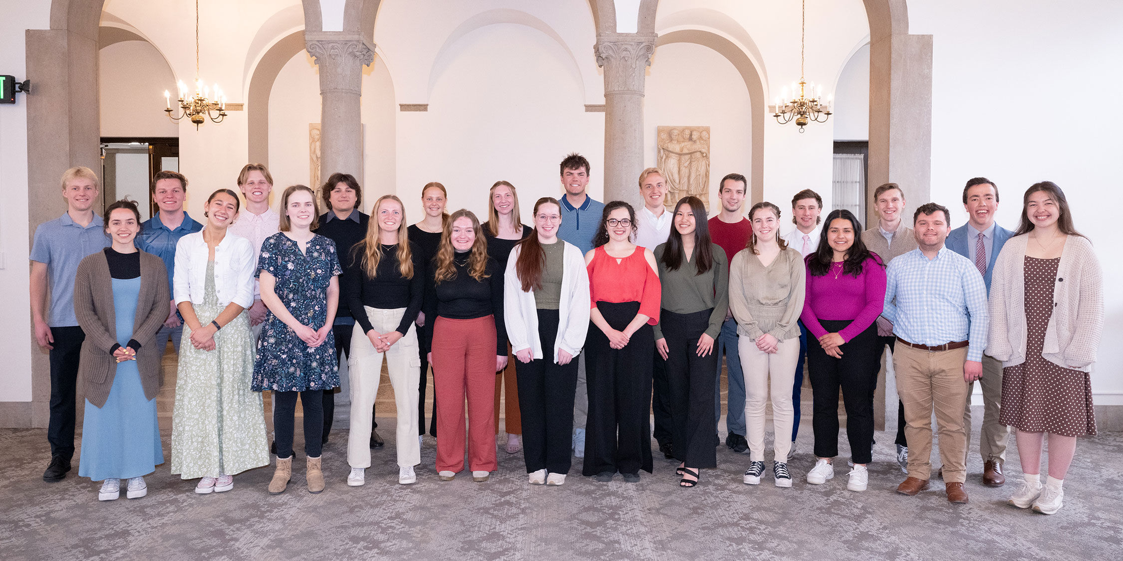 Students standing in Naz Great Room